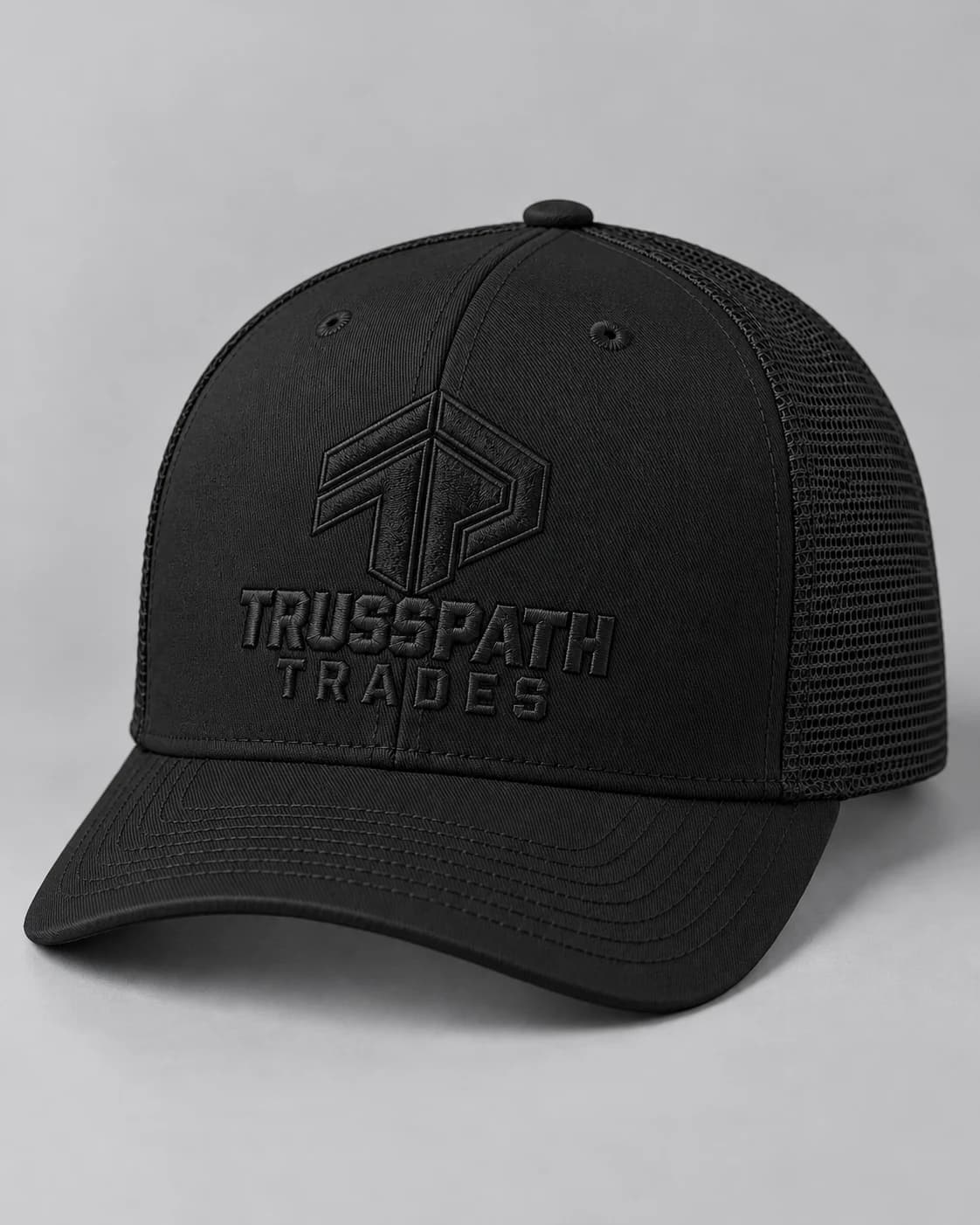 The Ghost Blackout Cap — front view on a black cap, garment mockup