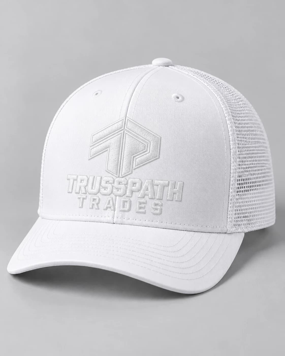 The Ghost Whiteout Cap — front view on a white cap, garment mockup