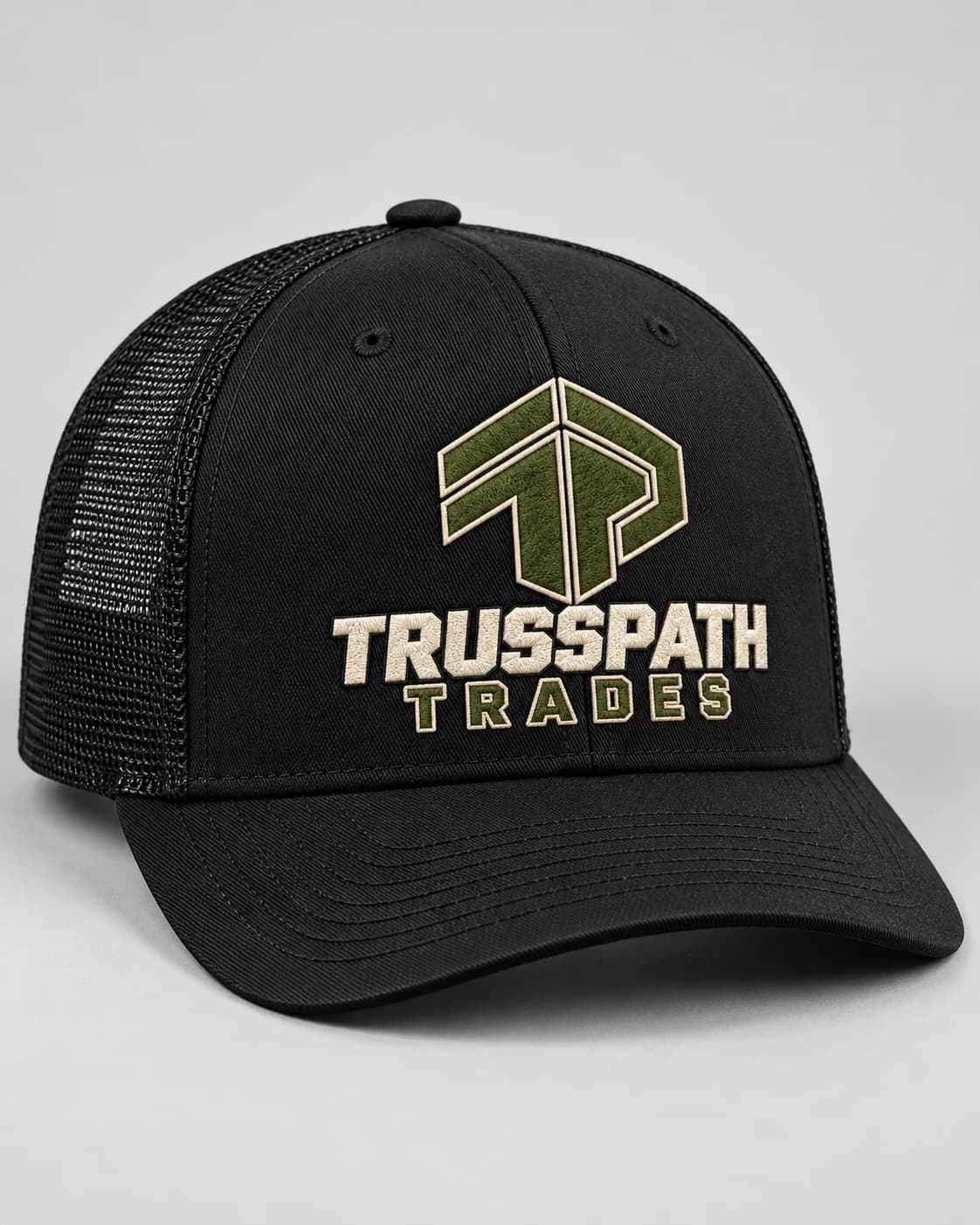 The Black Logo Cap — front view on a black cap, garment mockup