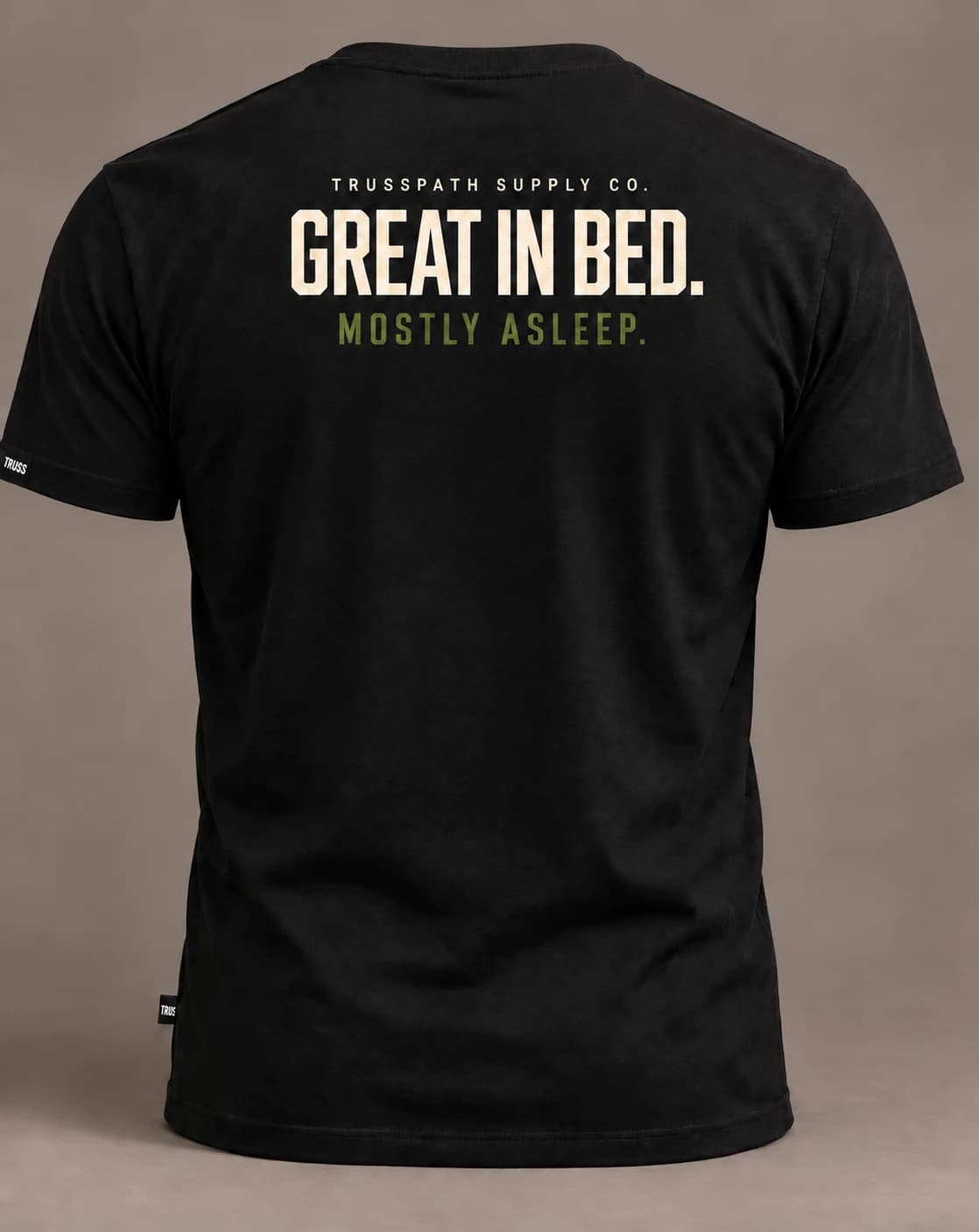Great in Bed — back view on a black graphic tee, garment mockup