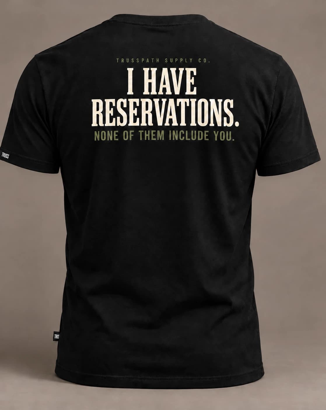 I Have Reservations — back view on a black graphic tee, garment mockup