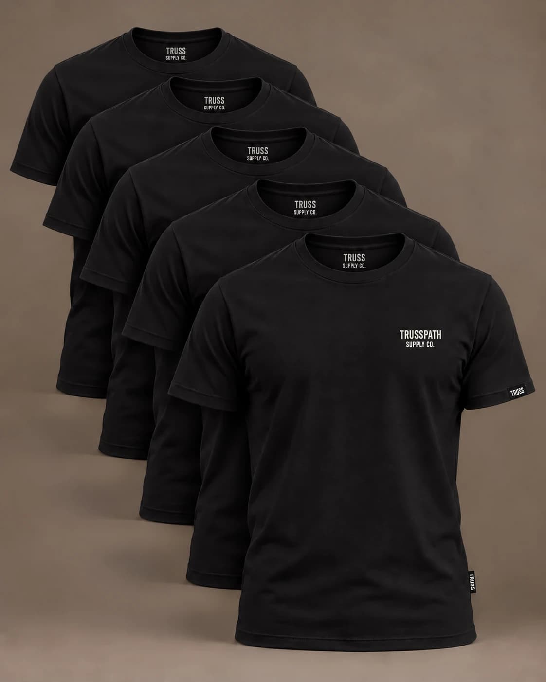 The Black Logo Tee Five-Pack — front view on a black five-pack of logo tees, garment mockup