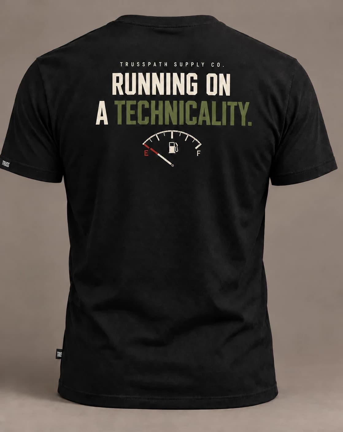 Running on a Technicality — back view on a black graphic tee, garment mockup